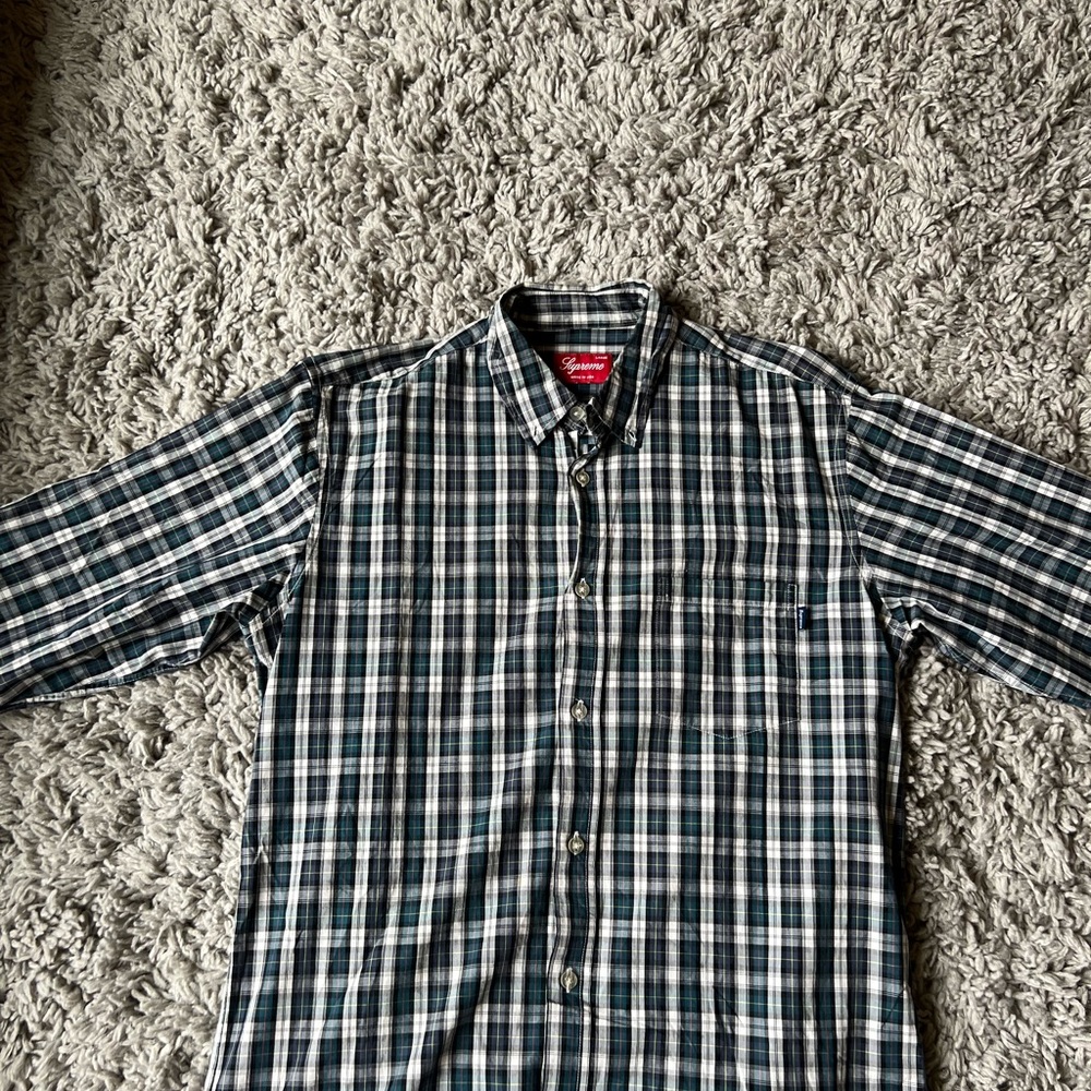 Men’s Large Supreme red button down long sleeve shirt.